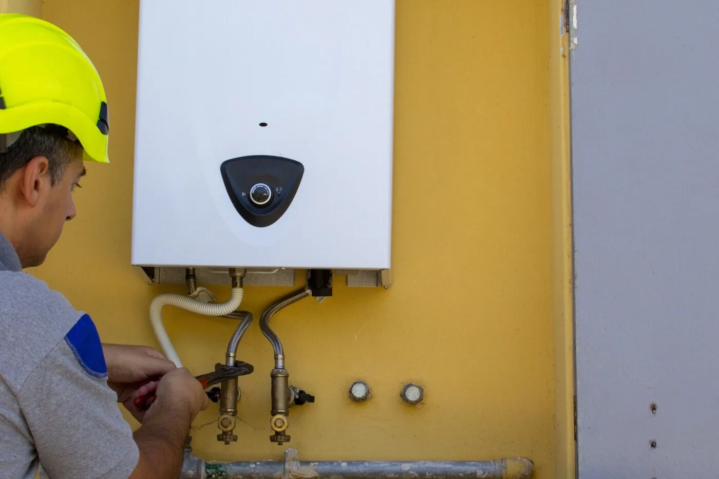 Unité murale de climatisation réversible installée dans un logement du département de l'Oise